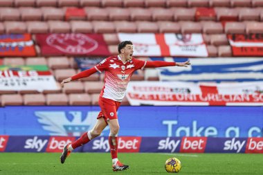 Barnsley 'li Mal de Gevigney, 27 Ocak 2024' te İngiltere 'nin Oakwell kentinde oynanan Sky Bet 1 karşılaşmasında takımına talimat verir.