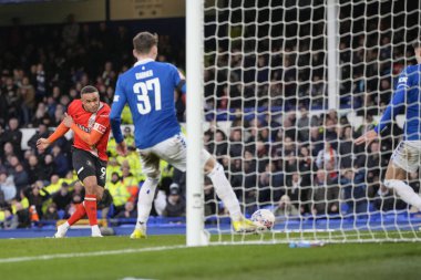 Luton Town 'dan Carlton Morris, 27 Ocak 202 tarihinde İngiltere' nin Liverpool kentinde Goodison Park 'ta oynanan dördüncü tur müsabakasında Everton, Luton Town' a karşı Everton FA Kupası karşılaşmasında Everton 'dan Nathan Patterson' ın atışını engelledi.