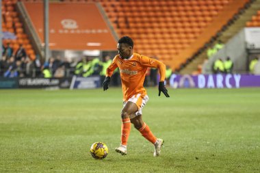 Blackpool 'dan Karamoko Dembl, 30 Ocak 2024' te Bloomfield Road, Blackpool, Birleşik Krallık 'ta oynanan Blackpool-Bolton Wanderers maçında Bristol Street Motors' un çeyrek final maçında topu aldı.