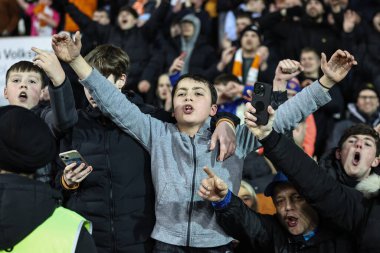 Blackpool taraftarları, 30 Ocak 202 'de Bloomfield Road, Blackpool, İngiltere' de oynanan Blackpool-Bolton Wanderers maçında Bristol Street Motors Kupa Çeyreği final maçında penaltılarda kazandığı galibiyeti kutladı.