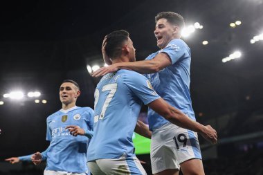Manchester City 'den Julin Ivarez, 31 Ocak 2024 tarihinde Etihad Stadyumu' nda oynanan Premier League maçında 1-0 'lık galibiyet golünü kutluyor.