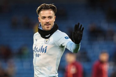 Manchester City 'den Jack Grealish Premier Lig karşılaşması öncesinde 31 Ocak 202' de Etihad Stadyumu 'nda Manchester City ile Burnley maçında ısındı.