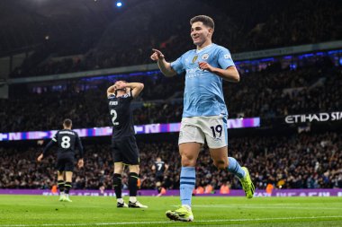 Manchester City 'den Julin Ivarez, 31 Ocak 2024 tarihinde Etihad Stadyumu' nda oynanan Premier League maçında 1-0 'lık galibiyet golünü kutluyor.