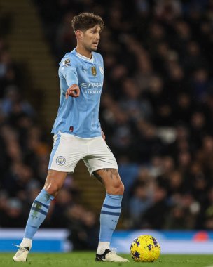 Manchester City 'den John Stones Premier League maçında topla Manchester City ile Burnley arasında Etihad Stadyumu, Manchester, İngiltere' de 31 Ocak 202