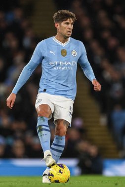 Manchester City 'den John Stones Premier League maçında topla Manchester City ile Burnley arasında Etihad Stadyumu, Manchester, İngiltere' de 31 Ocak 202