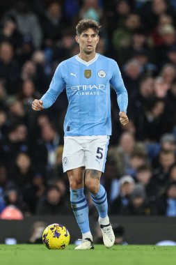 Manchester City 'den John Stones Premier League maçında topla Manchester City ile Burnley arasında Etihad Stadyumu, Manchester, İngiltere' de 31 Ocak 202