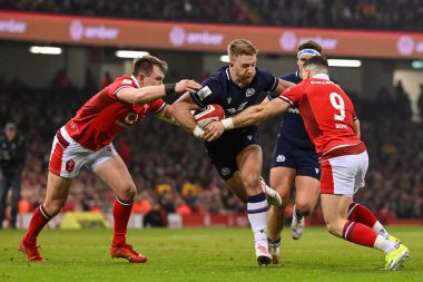 İskoçyalı Kyle Steyn, Galli Gareth Davies tarafından 3 Şubat 2024 tarihinde Principality Stadyumu, Cardiff, Birleşik Krallık 'ta oynanan Galler - İskoçya maçında yenildi.