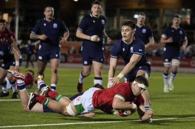 Galler U20 'den Morgan Morse, İskoçya U20' nin 2024 Guinness U20 maçında İskoçya U20 'lere karşı Stadiwm CSM, Colwyn Bay, Birleşik Krallık' ta 2 Şubat 202 'de oynanan maçta gol atmak için İskoçya U20' nin savunmasını geçti.