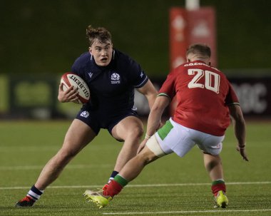 İskoçya U-20 takımından Kerr Yule, 2024 Guinness U20 maçında Galler 'den Harri Beddall ile İskoçya' dan U20 'ler arasındaki Stadiwm CSM, Colwyn Bay, İngiltere' den 2 Şubat 202 'de karşılaşacak.