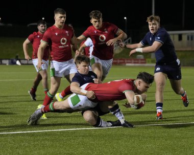 Galler U20 'den Harri Ackerman, daha sonra 2024 Guinness U20 maçında TMO kontrolü yapıldıktan sonra İngiltere' deki Stadyum CSM, Colwyn Körfezi, 2 Şubat 202 'de Galler ve İskoçya U20' lere karşı oynanan maçta yasaklanan bir deneme için dalışa başladı.