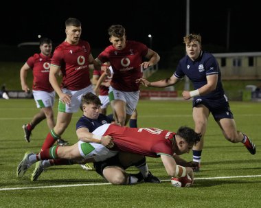 Galler U20 'den Harri Ackerman, daha sonra 2024 Guinness U20 maçında TMO kontrolü yapıldıktan sonra İngiltere' deki Stadyum CSM, Colwyn Körfezi, 2 Şubat 202 'de Galler ve İskoçya U20' lere karşı oynanan maçta yasaklanan bir deneme için dalışa başladı.