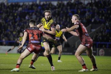 Warrington Wolves 'dan James Harrison, 3 Şubat 202' de Warrington, İngiltere 'deki Halliwell Jones Stadyumu' nda oynanan Rugby Ligi Joe Philbin Tanıklık Maçı 'nda Leoparların savunmasında yarıştı.