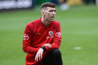 Maç öncesi ısınma oturumunda Barnsley 'li Conor Grant, 3 Şubat 202' de İngiltere 'deki Toughsheet Community Stadyumu' nda Sky Bet 1 karşılaşmasında Bolton Wanderers ile Barnsley karşılaşacak.
