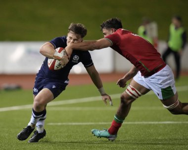 İskoçya 'dan Isaac Coates, Galler' den Lucas de la Rua tarafından 2024 Guinness U20-6 Milletler arası Galler - İskoçya U20 maçı sırasında Stadyum CSM, Colwyn Bay, Birleşik Krallık, 2 Şubat 202 'de oynanmıştır.