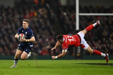 İskoçyalı Kyle Rowe, Galler 'li Owen Watkin' in 2024 Guinness 6 Milletler Şampiyonası 'nda İskoçya' ya karşı Principality Stadyumu, Cardiff, İngiltere 'de 3 Şubat 202' de oynanan Galler maçında aldığı mücadeleyi savuşturuyor.