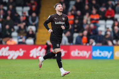Blackpool takımından James Husband 3 Şubat 202 'de Lamex Stevenage, İngiltere' de Stevenage-Blackpool maçında