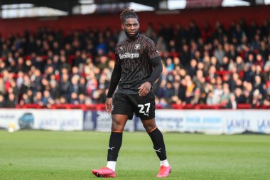 Blackpool takımından Kylian Kouassi 3 Şubat 202 'de İngiltere' nin Lamex Stadyumu 'nda Stevenage ve Blackpool maçında karşılaştı.