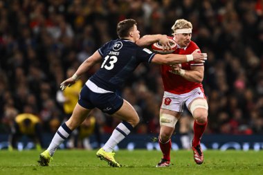 Galler 'den Aaron Wainwright, İskoçyalı Huw Jones tarafından 3 Şubat 202' de Principality Stadyumu, Cardiff, İngiltere 'de oynanan Galler - İskoçya maçında yenildi.