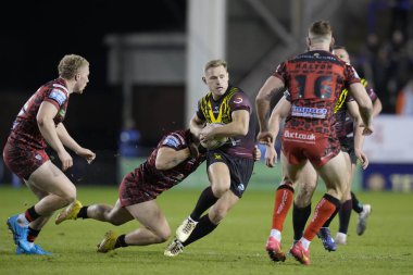 Warrington Wolves takımından Josh Drinkwater 3 Şubat 202 'de Warrington, İngiltere' deki Halliwell Jones Stadyumu 'nda Warrington Wolves - Leigh Leopards maçında Joe Philbin' in tanıklığı sırasında