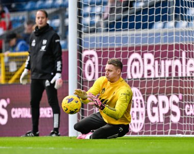 Bernd Leno of Fulham warms up ahead of the match, during the Premier League match Burnley vs Fulham at Turf Moor, Burnley, United Kingdom, 3rd February 202 clipart