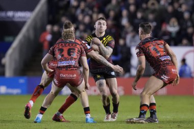 Warrington Wolves 'tan Sam Powell, 3 Şubat 202' de Warrington, İngiltere 'deki Halliwell Jones Stadyumu' nda oynanan Rugby Ligi Joe Philbin Tanıklık Maçı 'nda Leoparların savunmasında yarıştı.