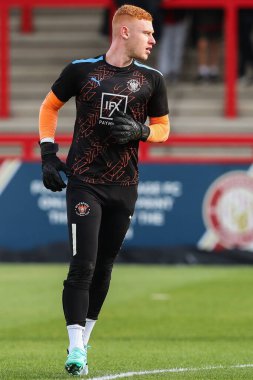 Blackpool 'dan Mackenzie Chapman 3 Şubat 202' de İngiltere 'nin Stevenage Stevenage Stadyumu' nda oynanan Sky Bet 1 maçı öncesinde ısınma turunda