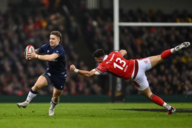 İskoçyalı Kyle Rowe, Galler 'li Owen Watkin' in 2024 Guinness 6 Milletler Şampiyonası 'nda İskoçya' ya karşı Principality Stadyumu, Cardiff, İngiltere 'de 3 Şubat 202' de oynanan Galler maçında aldığı mücadeleyi savuşturuyor.