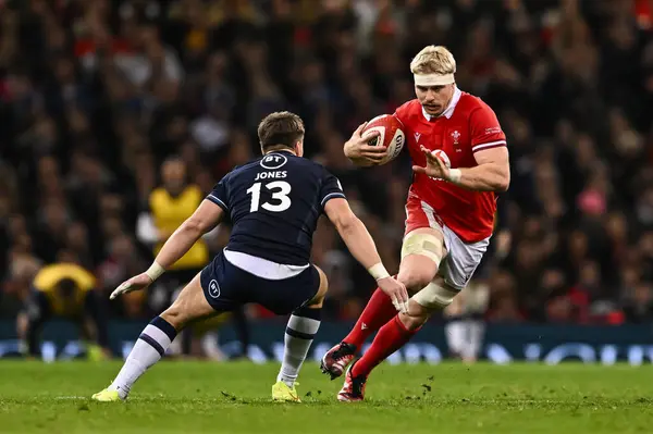 stock image Aaron Wainwright of Wales makes a break during the 2024 Guinness 6 Nations match Wales vs Scotland at Principality Stadium, Cardiff, United Kingdom, 3rd February 202