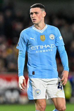 Manchester City 'den Phil Foden Premier League maçı sırasında Brentford Manchester City' ye karşı Gtech Community Stadyumu 'nda, 5 Şubat 202