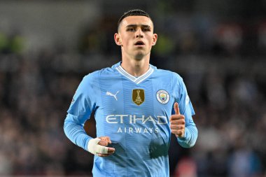 Manchester City 'den Phil Foden Premier League maçı sırasında Brentford Manchester City' ye karşı Gtech Community Stadyumu 'nda, 5 Şubat 202