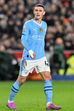 Manchester City 'den Phil Foden Premier League maçı sırasında Brentford Manchester City' ye karşı Gtech Community Stadyumu 'nda, 5 Şubat 202
