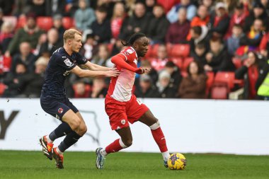 Barnsley 'den Devante Cole, 10 Şubat 202' de İngiltere 'nin Oakwell kentinde oynanan Sky Bet 1 karşılaşmasında topu sürüyor.