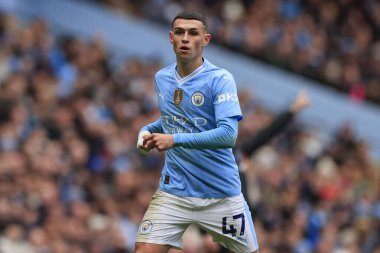 Manchester City 'den Phil Foden 10 Şubat 202 tarihinde Etihad Stadyumu' nda oynanan Premier League maçında Everton 'a karşı mücadele ediyor.