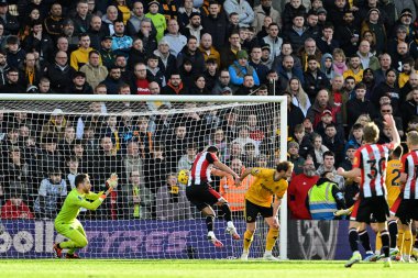 Brentford 'dan Christian Nrgaard, Premier League karşılaşmasında Brentford' a karşı Molineux, Wolverhampton, Birleşik Krallık 'ta 10 Şubat 2024' te oynanan Premier League maçında Brentford 'a 0-1 önde gidiyor.