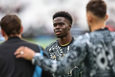 Arsenal 'den Bukayo Saka Premier Lig maçı sırasında 11 Şubat 202' de Londra Stadyumu 'nda West Ham United Arsenal' e karşı.