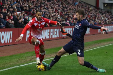 Barnsley 'den Barry Cotter, 10 Şubat 202' de İngiltere 'nin Barnsley kentinde oynanan Sky Bet 1 karşılaşmasında Leyton Orient takımından Tom James ile karşılaştı.