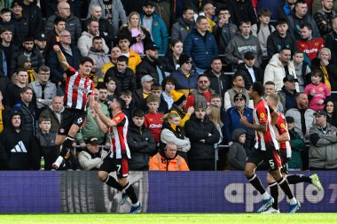 Brentford 'dan Christian Nrgaard, Premier League karşılaşmasında Brentford' a karşı Molineux, Wolverhampton, Birleşik Krallık 'ta 10 Şubat 2024' te oynanan Premier League maçında Brentford 'a 0-1 yenilmesi hedefini kutluyor.