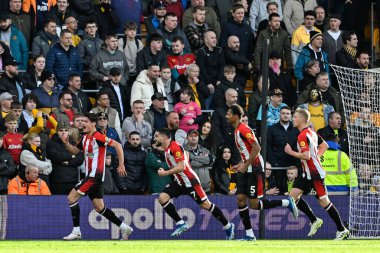 Brentford 'dan Christian Nrgaard, Premier League karşılaşmasında Brentford' a karşı Molineux, Wolverhampton, Birleşik Krallık 'ta 10 Şubat 2024' te oynanan Premier League maçında Brentford 'a 0-1 yenilmesi hedefini kutluyor.
