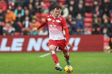 Barnsley 'den Josh Earl, 10 Şubat 202' de İngiltere 'nin Oakwell kentinde oynanan 1. Gökyüzü İddia Ligi maçında topu Barnsley' e karşı Leyton Orient 'e verdi.