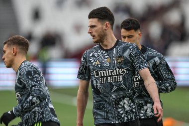 Arsenal 'den Declan Rice Premier League maçı sırasında Londra Stadyumu' nda West Ham United ve Arsenal maçında ısınma turunda, 11 Şubat 202