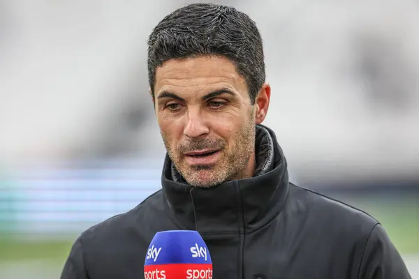 stock image Mikel Arteta manager of Arsenal speaks to Sky Sports during the Premier League match West Ham United vs Arsenal at London Stadium, London, United Kingdom, 11th February 202