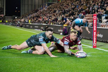 Leigh Leopards 'dan Josh Charnley, 16 Şubat 202' de Leigh Spor Köyü 'nde Leigh Leopards ve Huddersfield Giants arasında oynanan Betfred Süper Lig 1. Raundunda bir deneme için sahaya çıkıyor.