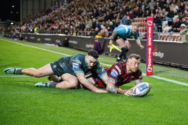 Leigh Leopards 'dan Josh Charnley, 16 Şubat 202' de Leigh Spor Köyü 'nde Leigh Leopards ve Huddersfield Giants arasında oynanan Betfred Süper Lig 1. Raundunda bir deneme için sahaya çıkıyor.