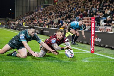 Leigh Leopards 'dan Josh Charnley, 16 Şubat 202' de Leigh Spor Köyü 'nde Leigh Leopards ve Huddersfield Giants arasında oynanan Betfred Süper Lig 1. Raundunda bir deneme için sahaya çıkıyor.