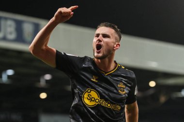 Southampton 'dan Taylor Harwood-Bellis, 16 Şubat 202' de Hawthorns, West Bromwich, İngiltere 'de oynanan West Bromwich Albion-Southampton maçında takımının 0-2 kazanma golünü kutluyor.