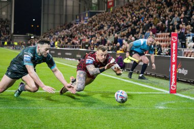 Leigh Leopards 'dan Josh Charnley, 16 Şubat 202' de Leigh Spor Köyü 'nde Leigh Leopards ve Huddersfield Giants arasında oynanan Betfred Süper Lig 1. Raundunda bir deneme için sahaya çıkıyor.