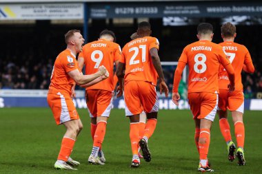 Blackpool 'dan Shayne Lavery, 17 Şubat 202' de İngiltere 'nin Peteron Homes Stadyumu' nda oynanan Sky Bet League 1 karşılaşmasında 1-1 'lik galibiyetini kutluyor.