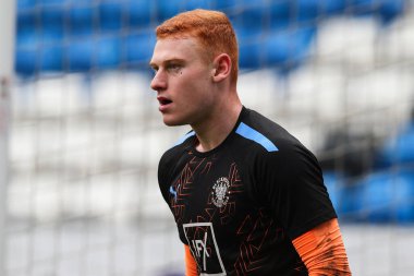 Blackpool 'dan Mackenzie Chapman 17 Şubat 202' de İngiltere 'nin Peterborough Homes Stadyumu' nda oynanan Sky Bet Lig 1 maçı öncesinde ısınma turunda