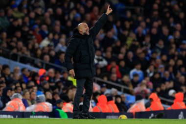 Manchester City 'nin Chelsea' ye karşı 17 Şubat 202 'de Etihad Stadyumu' nda oynanan Premier League maçında saha kenarındaki Manchester City teknik direktörü Pep Guardiola