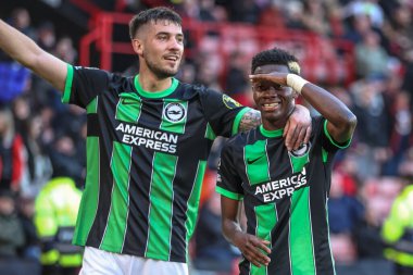 Brighton & Hove Albion 'dan Simon Adingra, 18 Şubat 202' de Bramall Lane, Sheffield, İngiltere 'de oynanan Premier League maçı Sheffield United ve Hove Albion maçında 0-5' lik galibiyet golünü kutluyor.